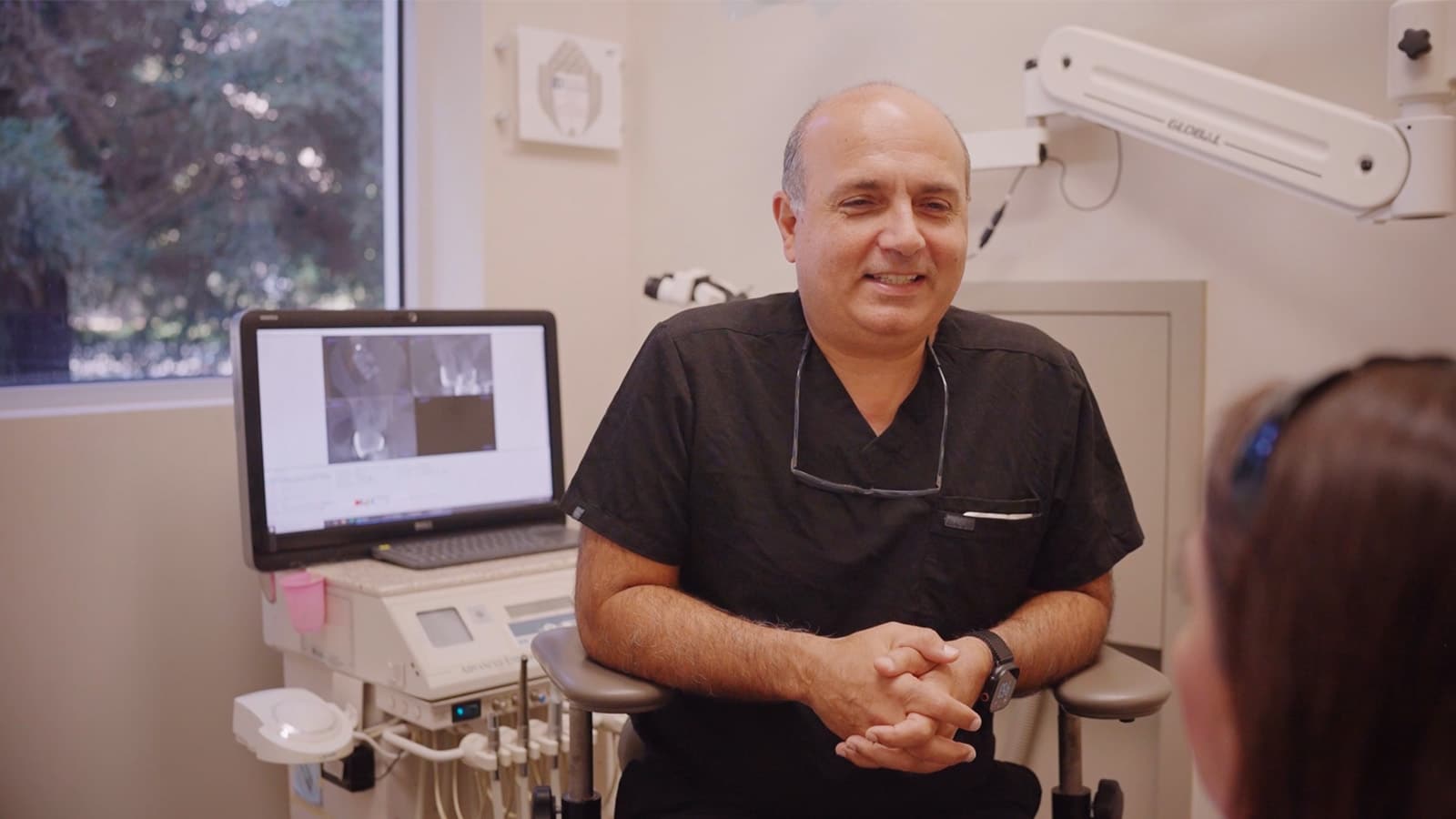 25 doctor smiling patient 1